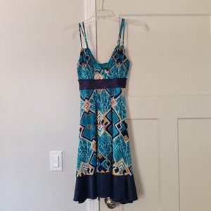 Express strappy teal, navy, cream, and goldenrod geometric fit & flare dress